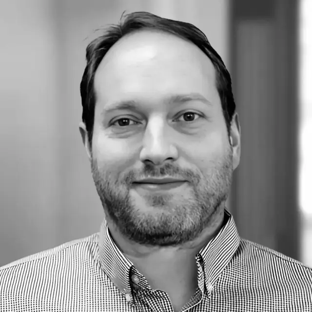 A headshot photo of Neil Campbell,  Intellinetics General Manager Document Services Divison.