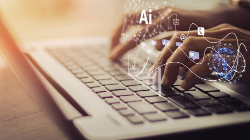 hands on laptop using AI technology