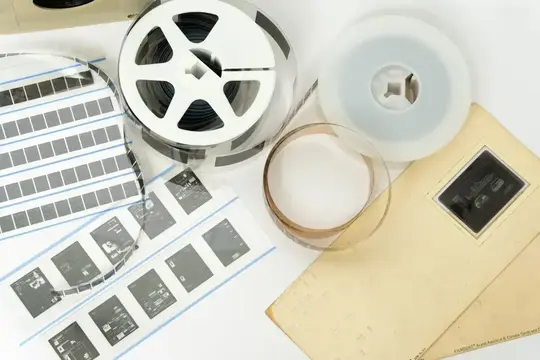 Microfilm reels, microfiche, aperture cards, and other micrographic media representing archival records and document preservation.