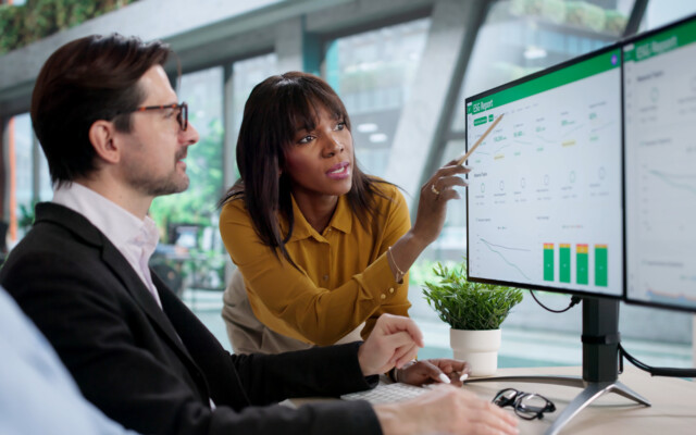employees reviewing FiscalVue Budget Intelligence