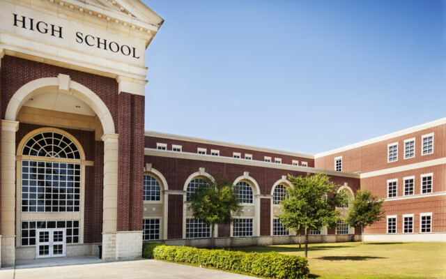 Back to School:  High school building entrance.  Copyspace and sky.  SEE MORE LIKE THIS... Similar images in lightboxes below.