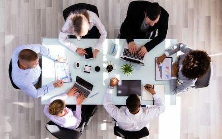 employees around a table