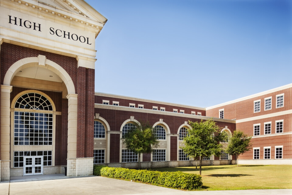 Back to School:  High school building entrance.  Copyspace and sky.  SEE MORE LIKE THIS... Similar images in lightboxes below.