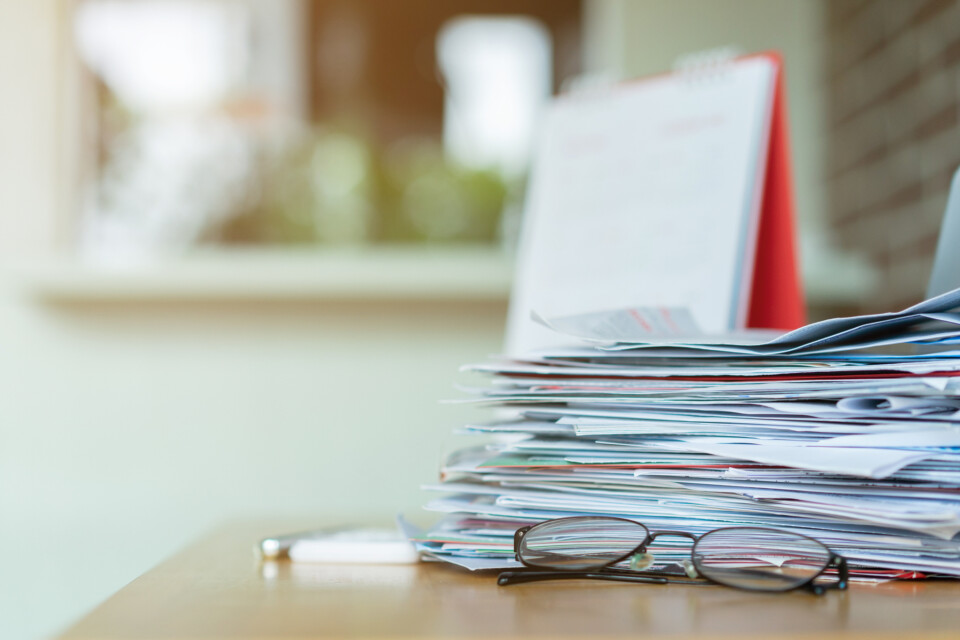 stack of papers on a desk