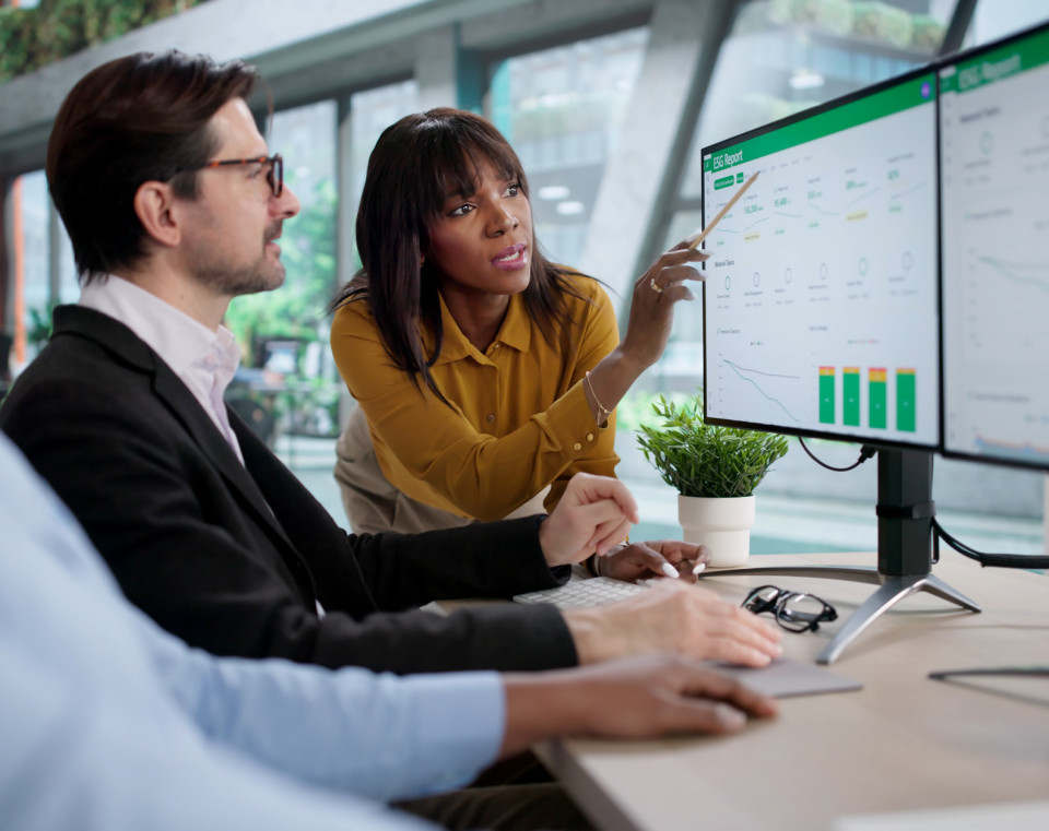 employees reviewing FiscalVue Budget Intelligence