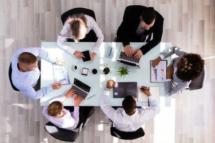 employees around a table